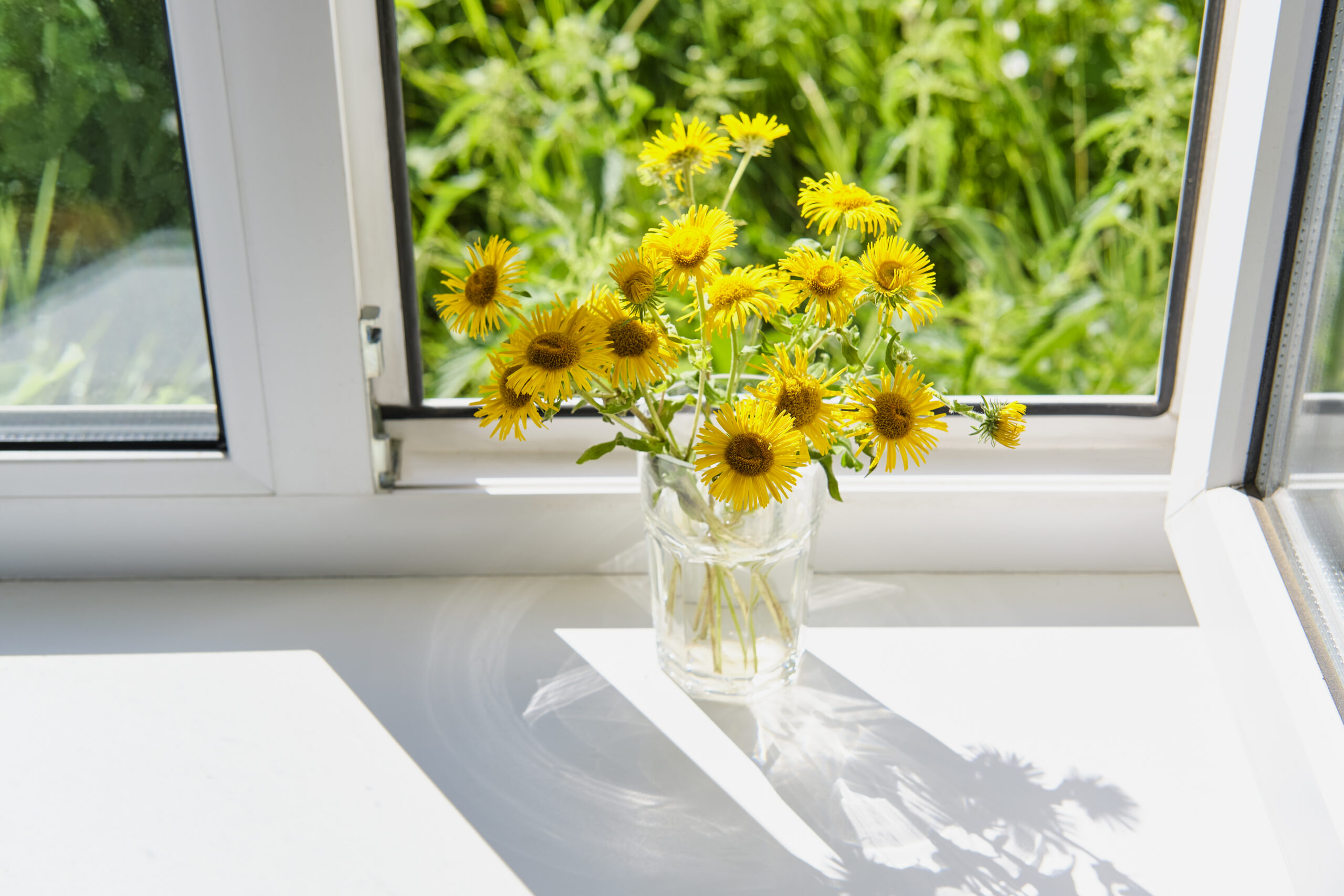Premium energy efficient windows in Durango reflecting intense summer solar heat to keep home interiors cool and comfortable.