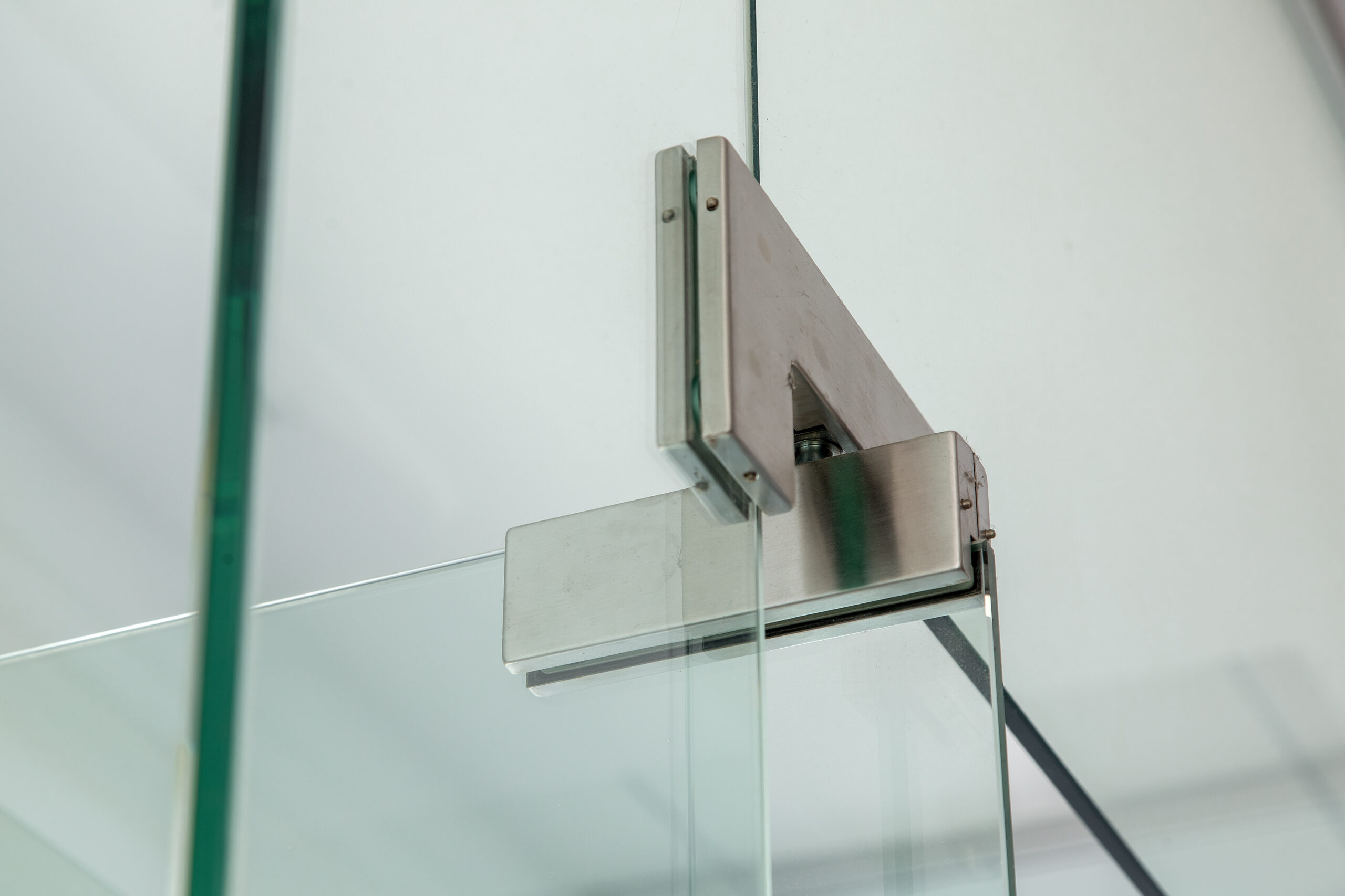 Custom frameless glass shower door installed by Integrity Glass for a modern bathroom renovation.